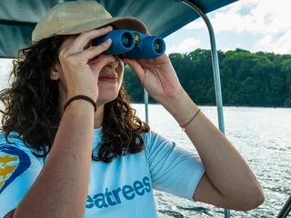 Woman looking through binoculars